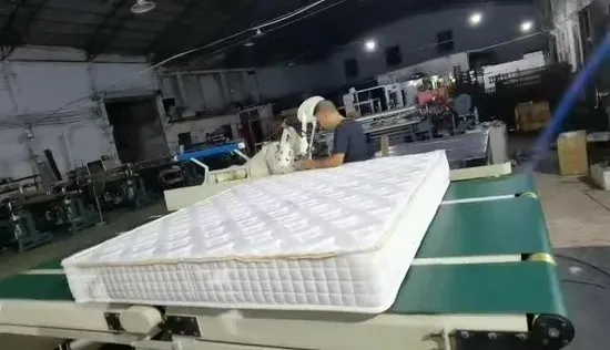 Macchina automatica per bordare materassi