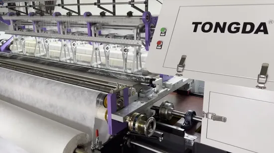 Macchina per quilting multiago a punto catenella digitalizzata e computerizzata